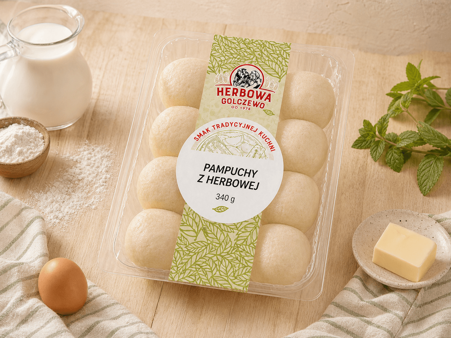 Pampuchy z Herbowej Herbowa — wizualizacja tymczasowa zamkniętego opakowania, przygotowana bez rzeczywistego zdjęcia produktu. Do zastąpienia po dostarczeniu fotografii.